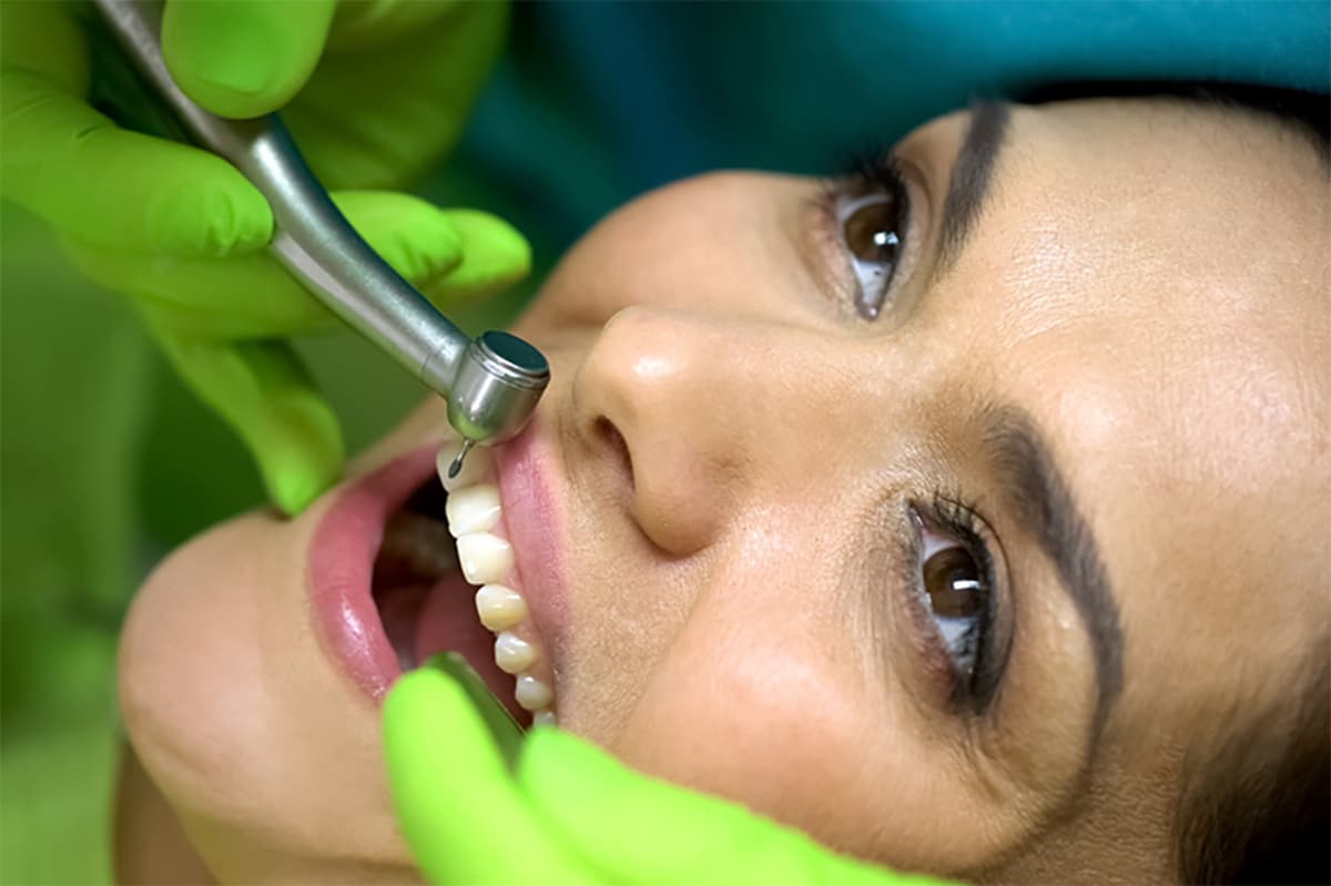 Dental patient undergoing a treatment as part of a full mouth rehabilitation